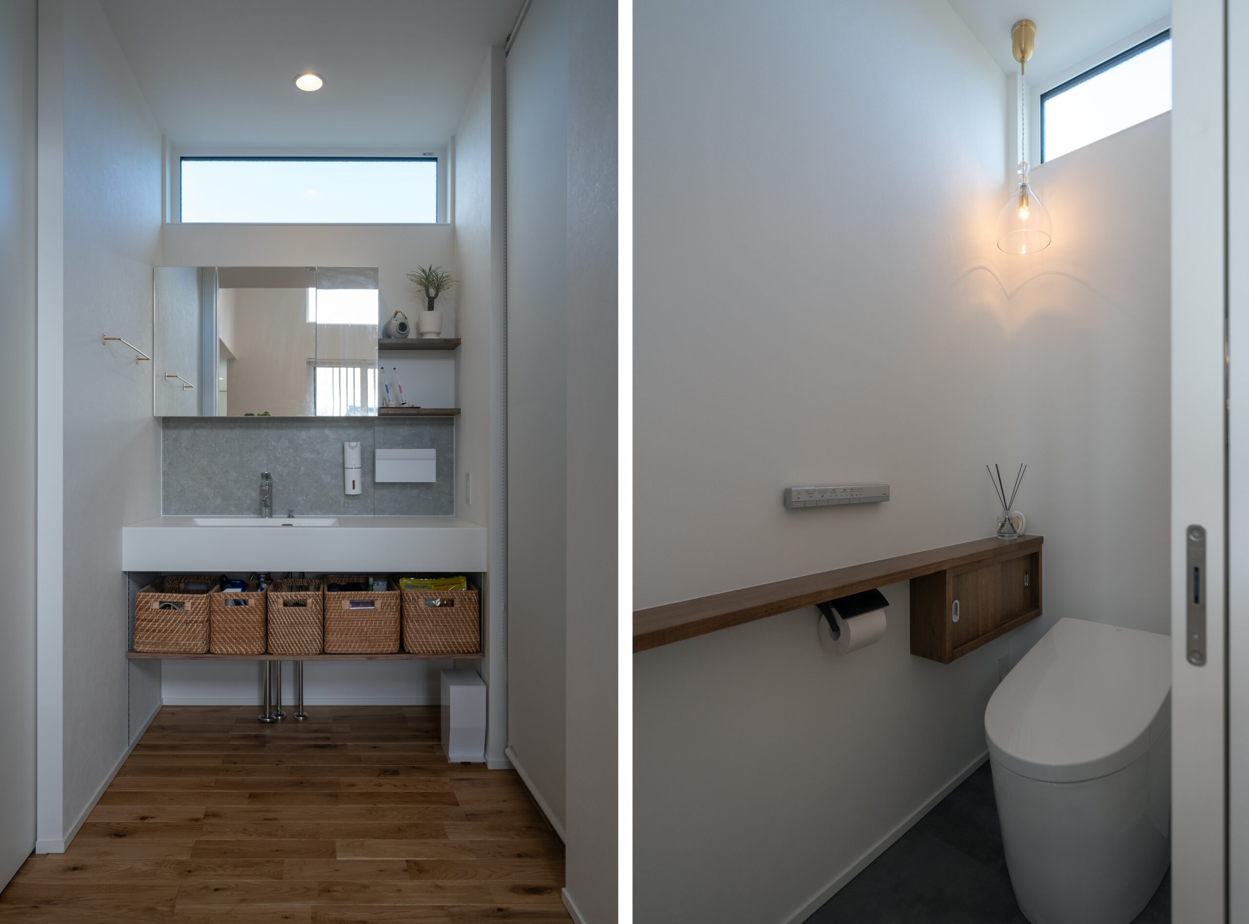 造作洗面台とペンダントライトのあるトイレ